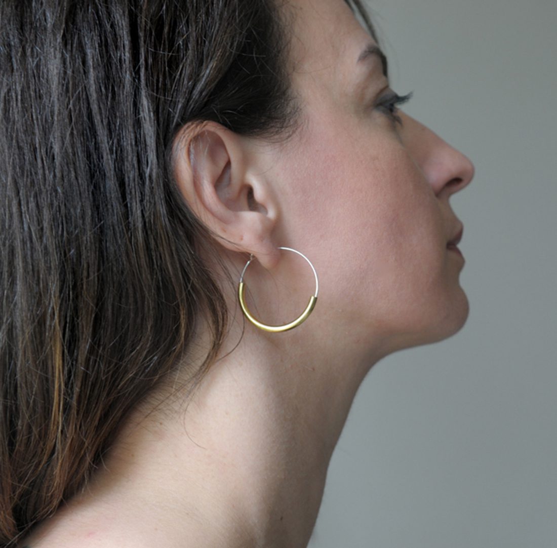 Silver hoops with brass curve