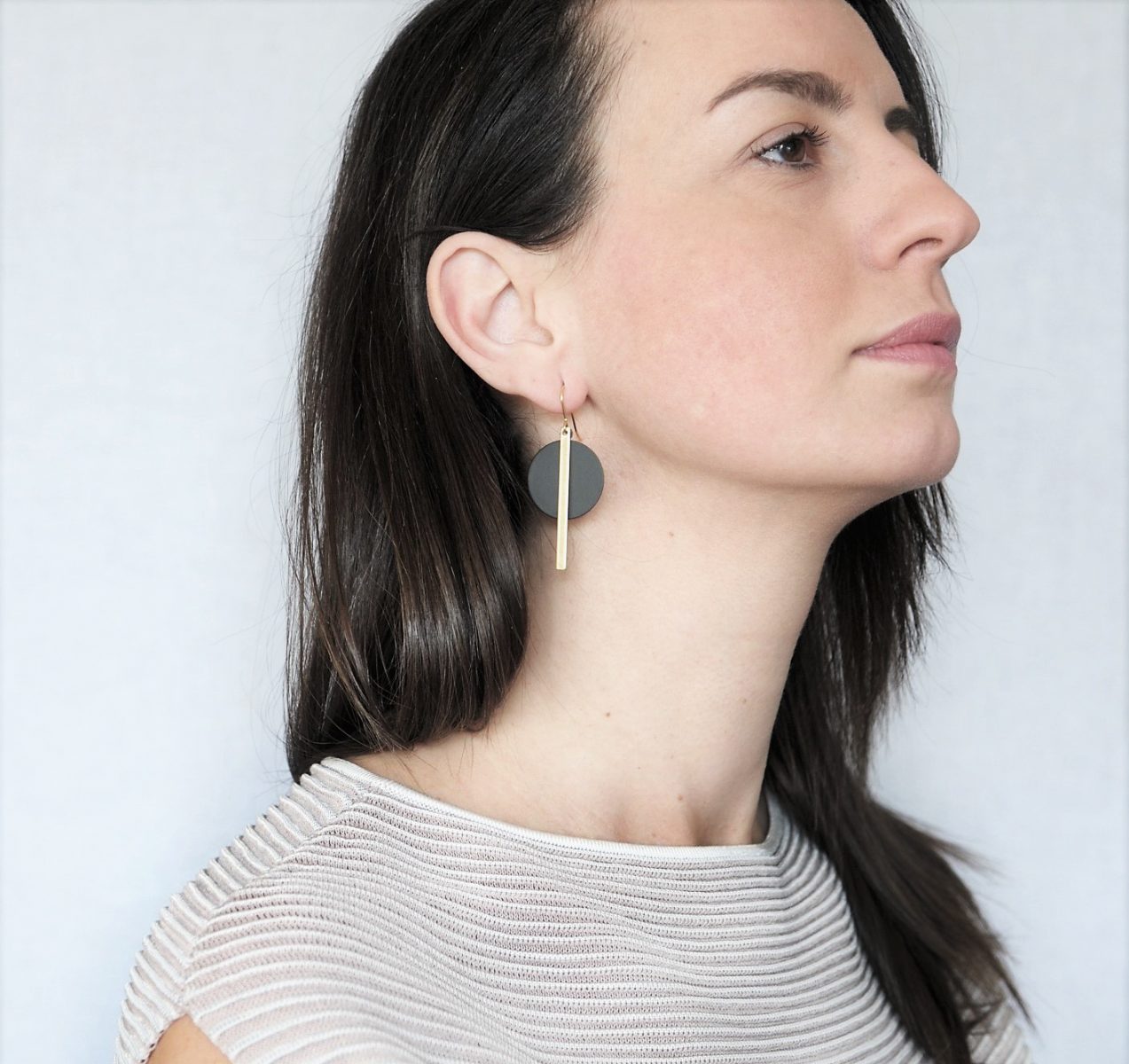 Black disc and brass bar earrings