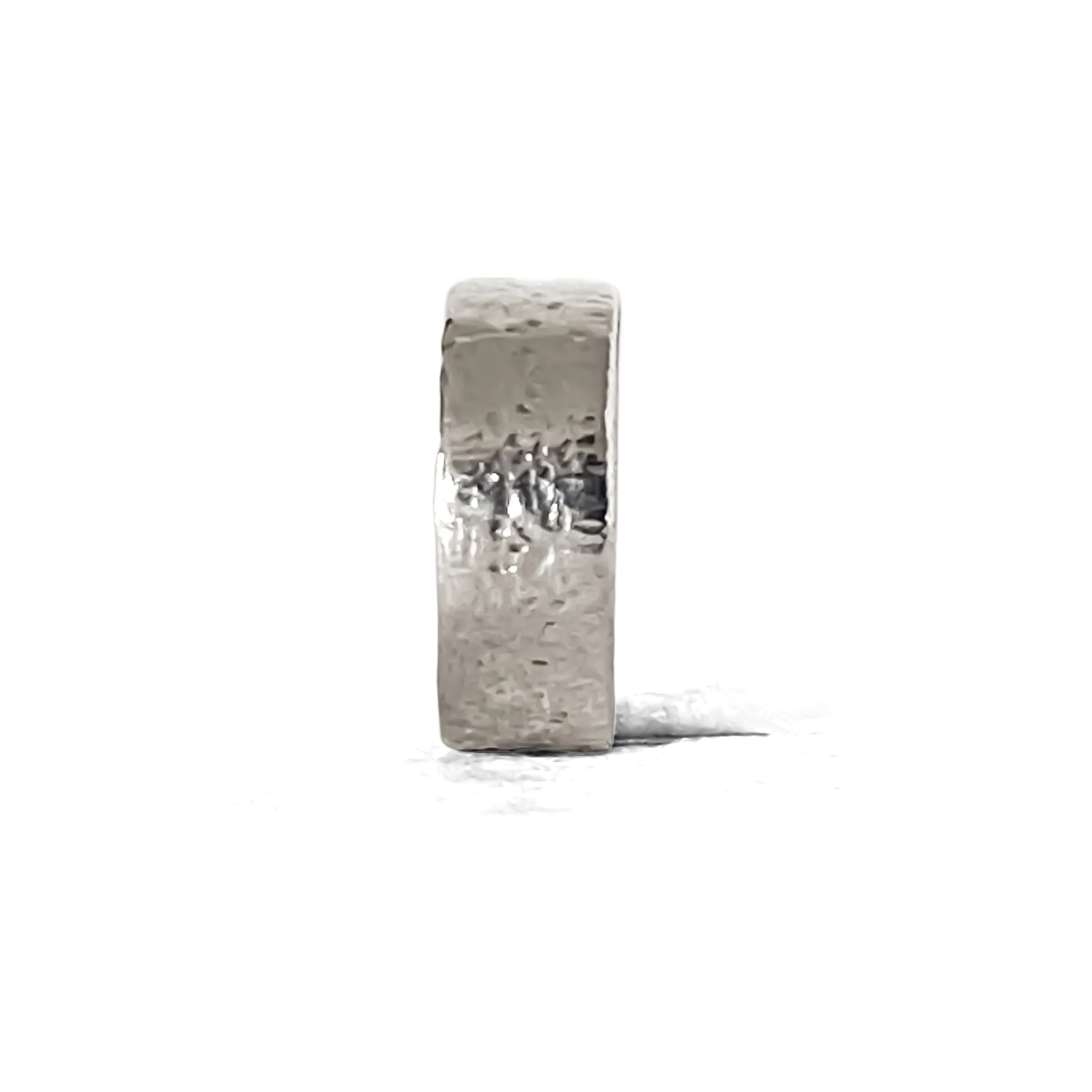 Side profile of a hammered silver ring on a clean white background.