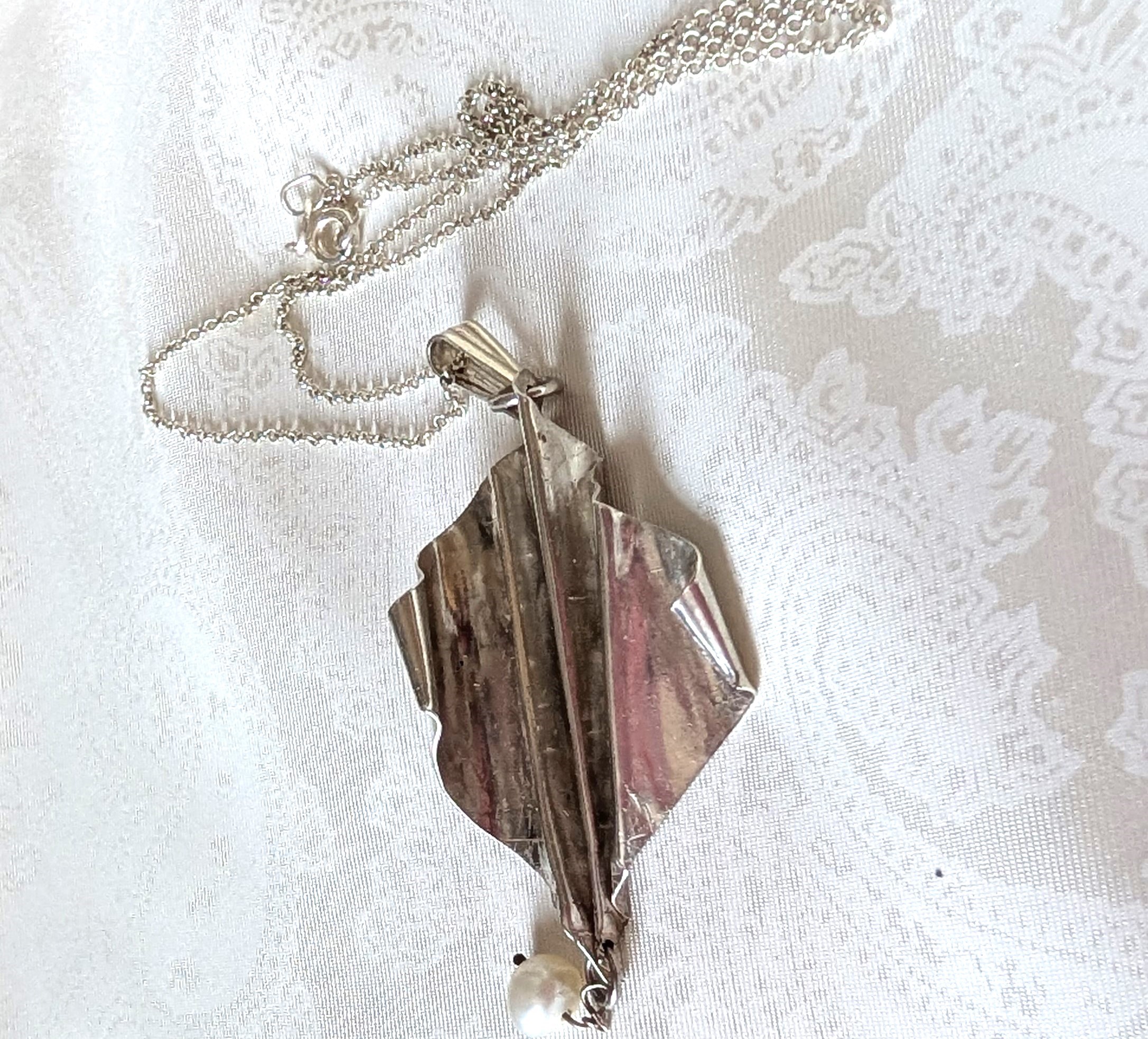 Fold formed silver pendant