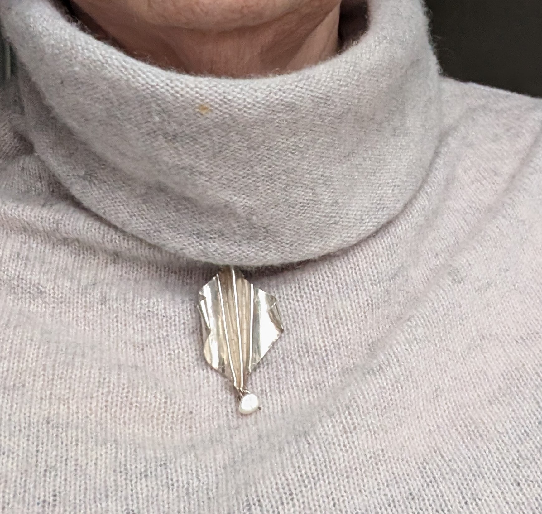Fold formed silver pendant